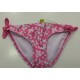 culetin fucsia flores blancas