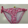 culetin fucsia flores blancas